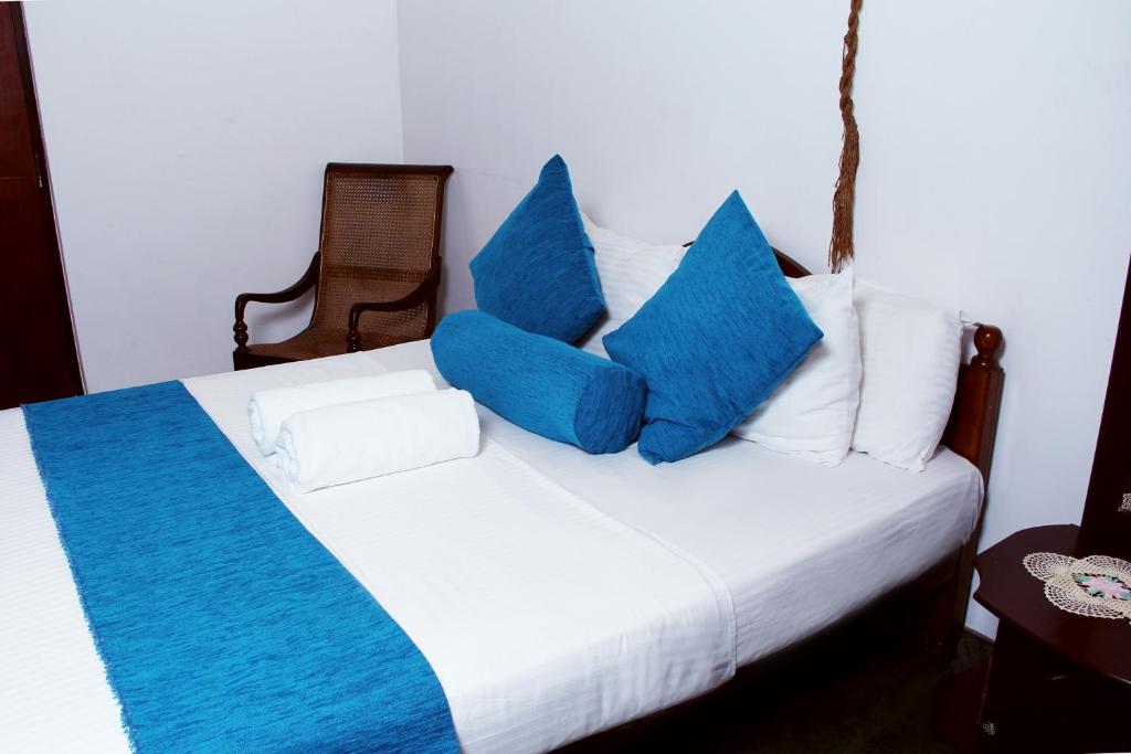 Postel nebo postele na pokoji v ubytování Bethel Rest Homestay