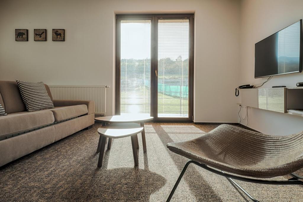 TV a/nebo společenská místnost v ubytování Village Resort Hanuliak Apartmany