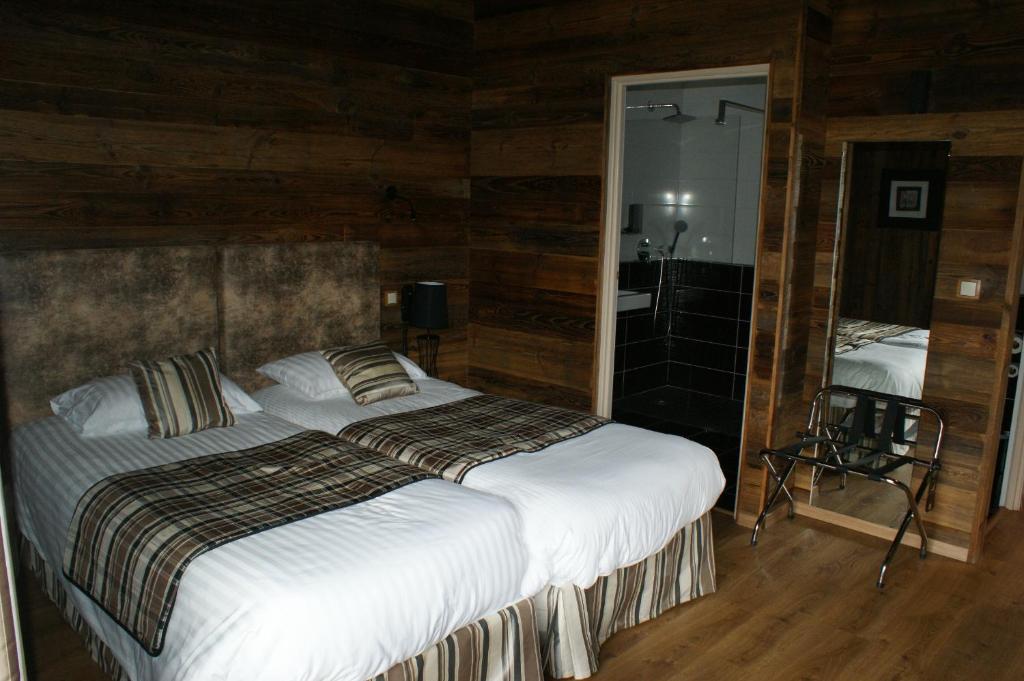 Postel nebo postele na pokoji v ubytování Hotel Blanc