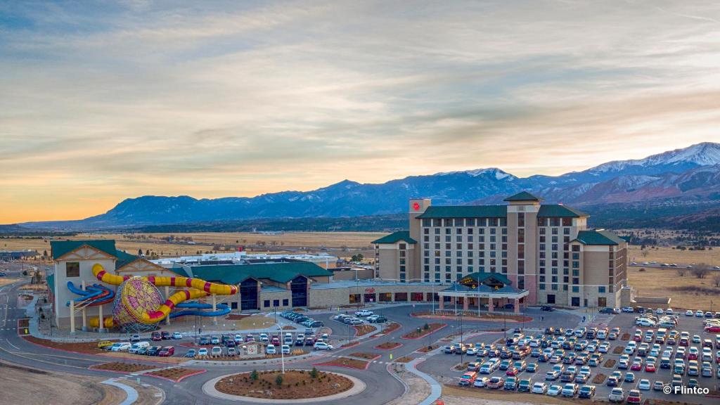 an aerial view of a hotel with a parking lot at Great Wolf Lodge Colorado Springs in Colorado Springs