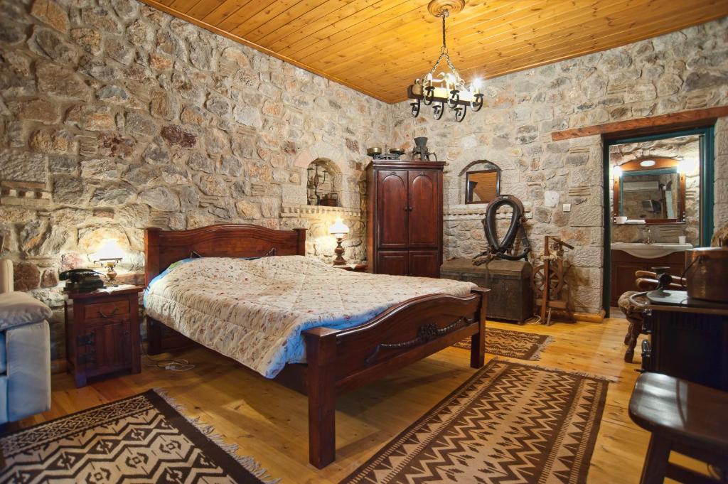 Postel nebo postele na pokoji v ubytování Alexandros Pension