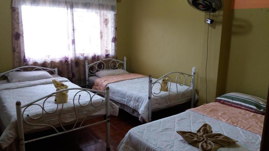 Postel nebo postele na pokoji v ubytování Hostal Dorys Mar
