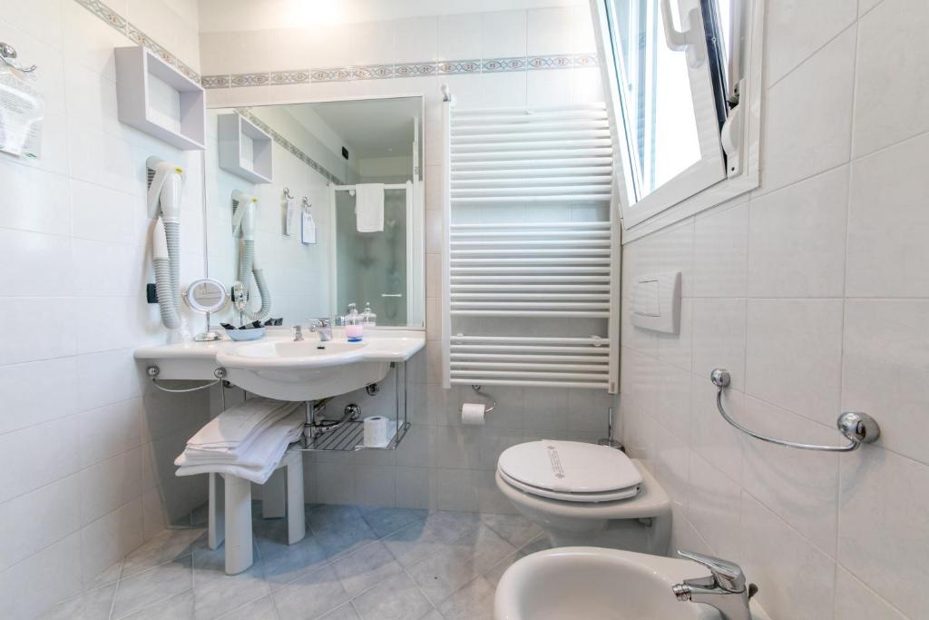 Koupelna v ubytování Hotel Helios