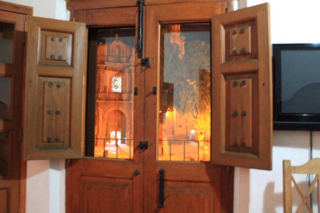 TV a/nebo společenská místnost v ubytování Hotel Casa Oratorio "Adults Only"