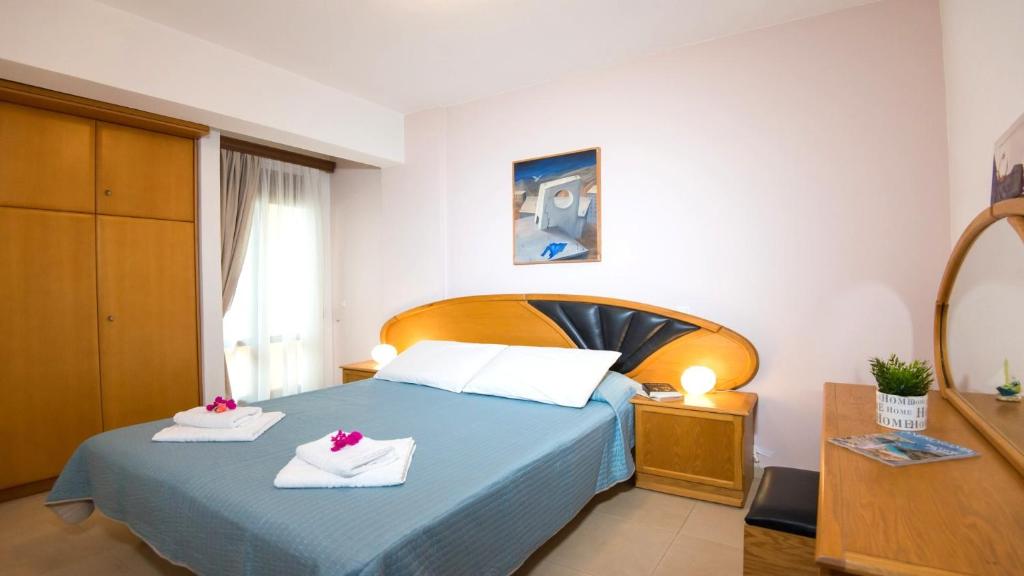 A bed or beds in a room at Casa Nerium