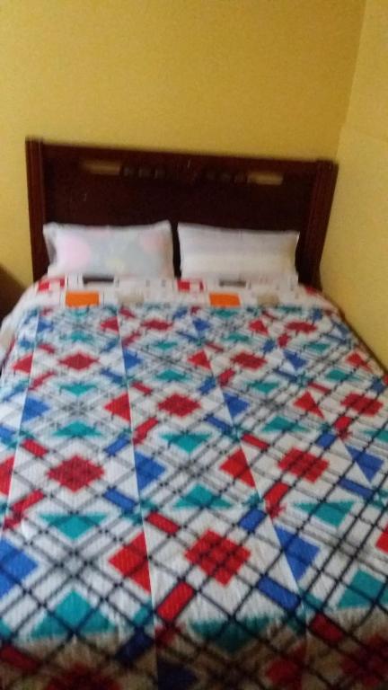Postel nebo postele na pokoji v ubytování Hotel Navarra