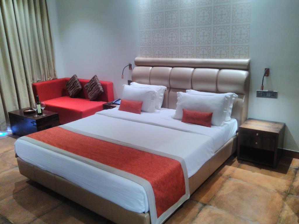 Кровать или кровати в номере The Ivy Anjuna