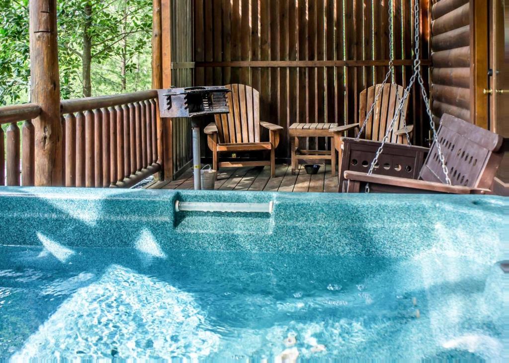 a swimming pool with sharks in the middle of a house at Bear Hug #18 in Sevierville