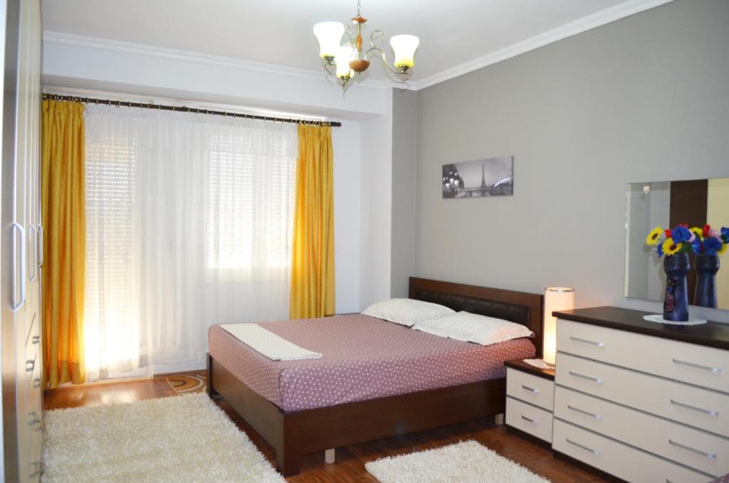 Ένα ή περισσότερα κρεβάτια σε δωμάτιο στο Belvedere Apartment