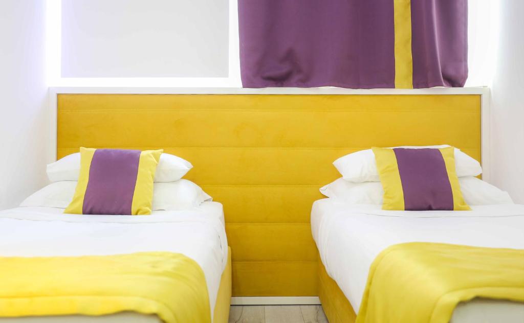Postel nebo postele na pokoji v ubytování Hotel Boutique Libris