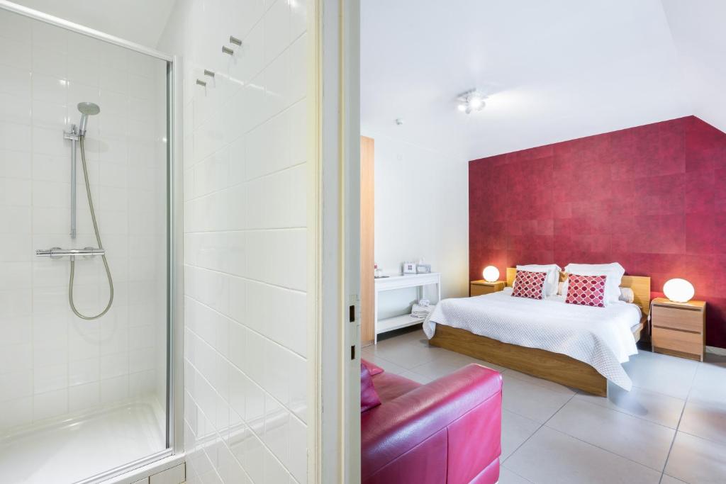 Łóżko lub łóżka w pokoju w obiekcie B&B visavis