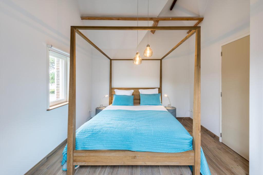 Łóżko lub łóżka w pokoju w obiekcie B&B visavis
