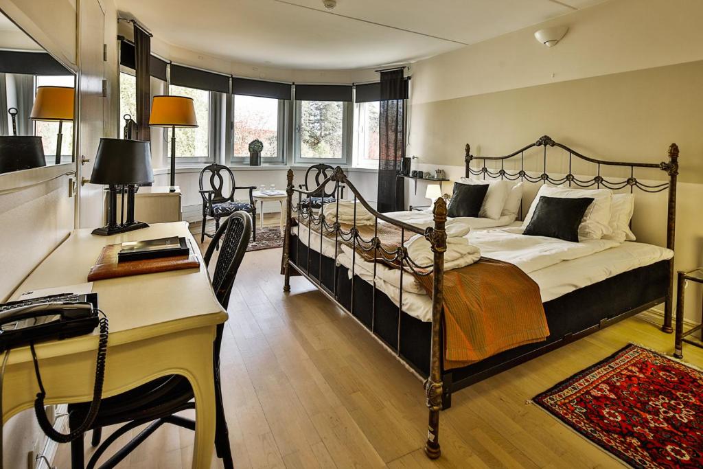 Postel nebo postele na pokoji v ubytování First Hotel Olofström