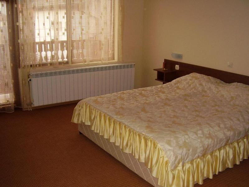 Postel nebo postele na pokoji v ubytování Guesthouse Kiritsovi