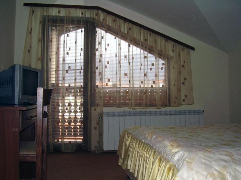 Postel nebo postele na pokoji v ubytování Guesthouse Kiritsovi