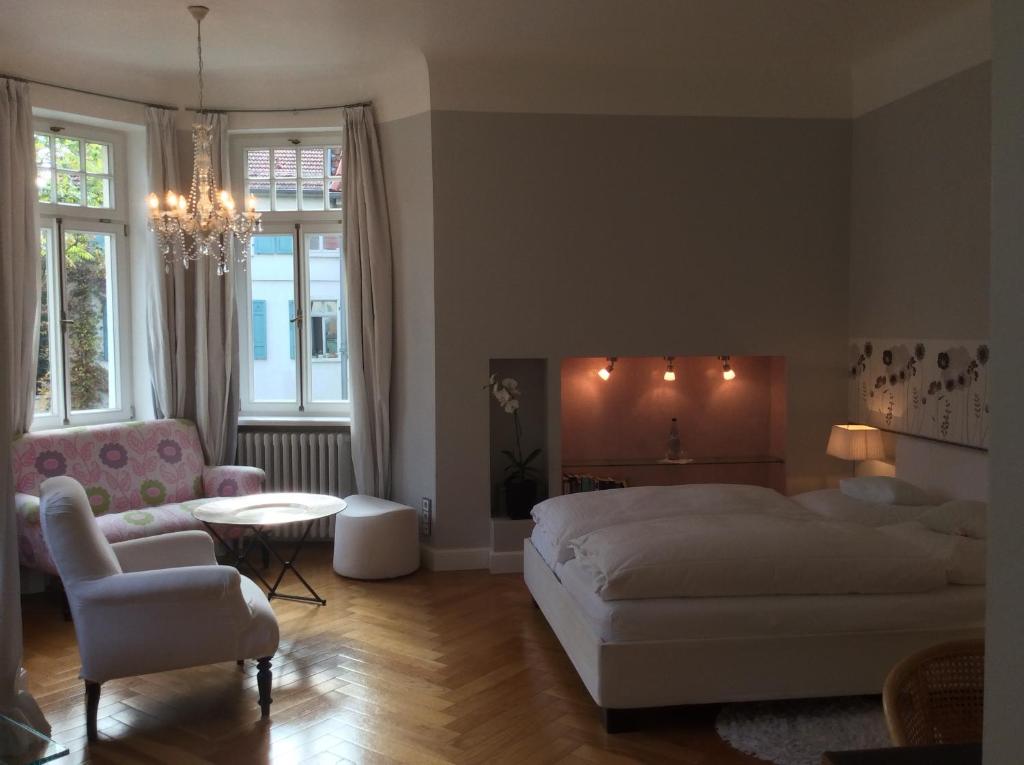 Postel nebo postele na pokoji v ubytování Hotel Heidelberg Astoria