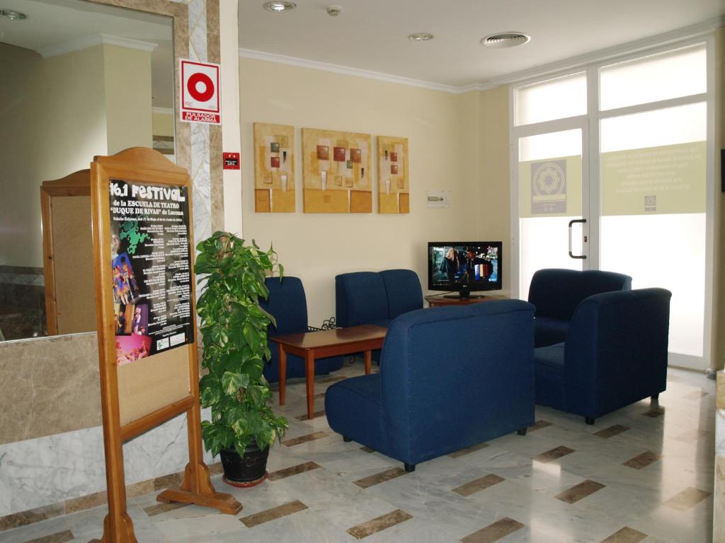 TV a/nebo společenská místnost v ubytování Hotel Al-Yussana