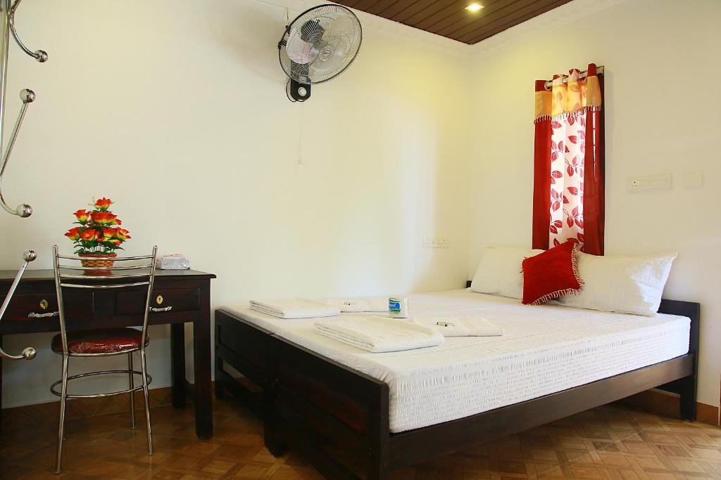 Postel nebo postele na pokoji v ubytování Marari Anandu Beach Villa