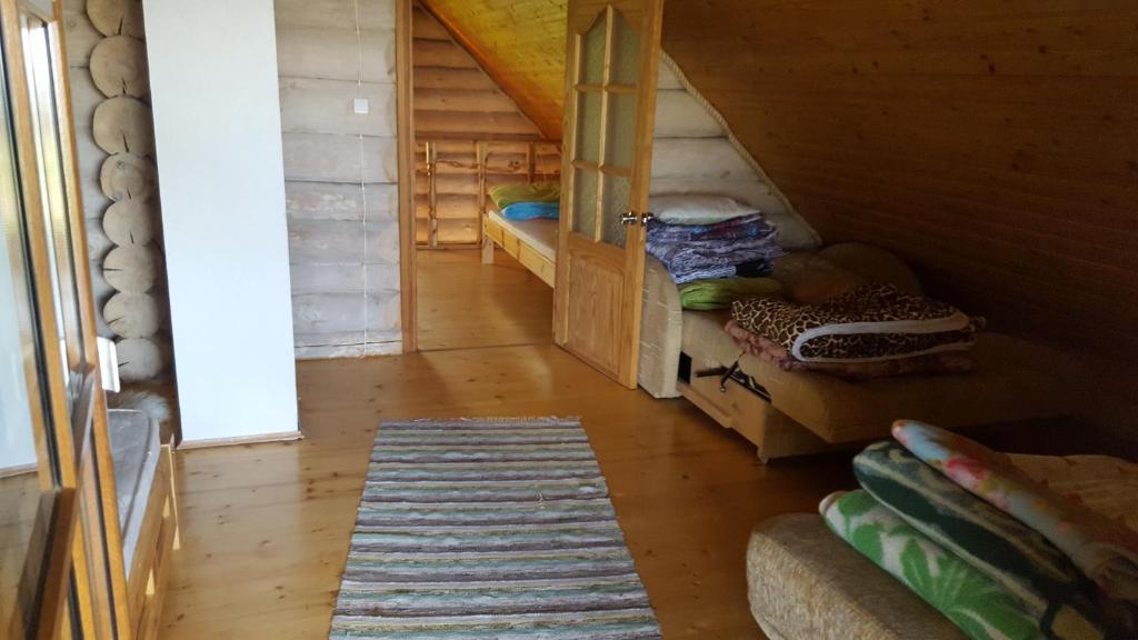 Postel nebo postele na pokoji v ubytování Oksa Puhkemaja