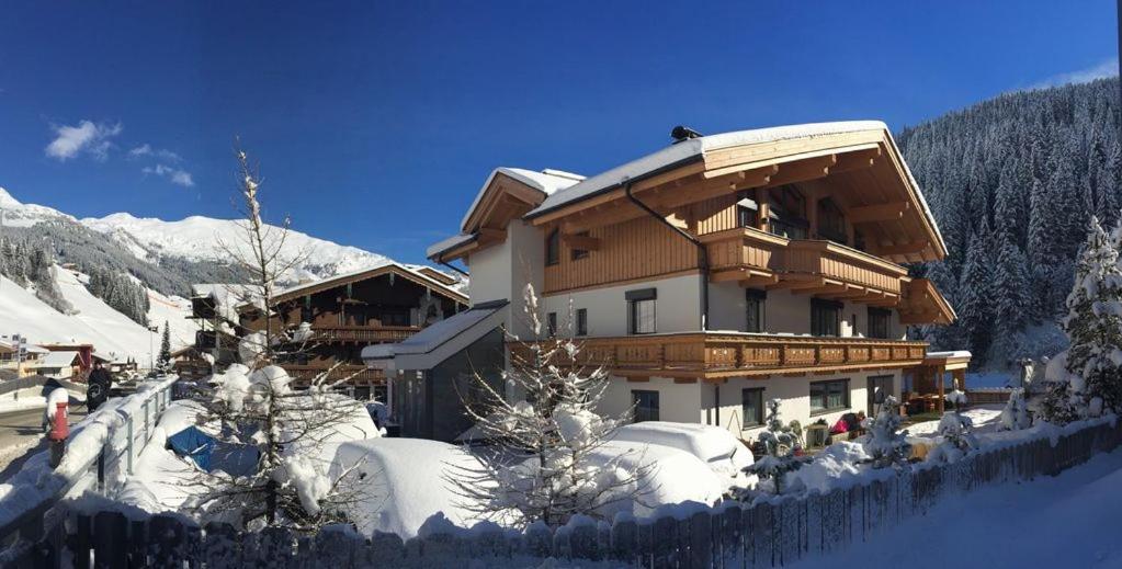 a large building with snow on the ground in front at TUX DIAMANT in Tux