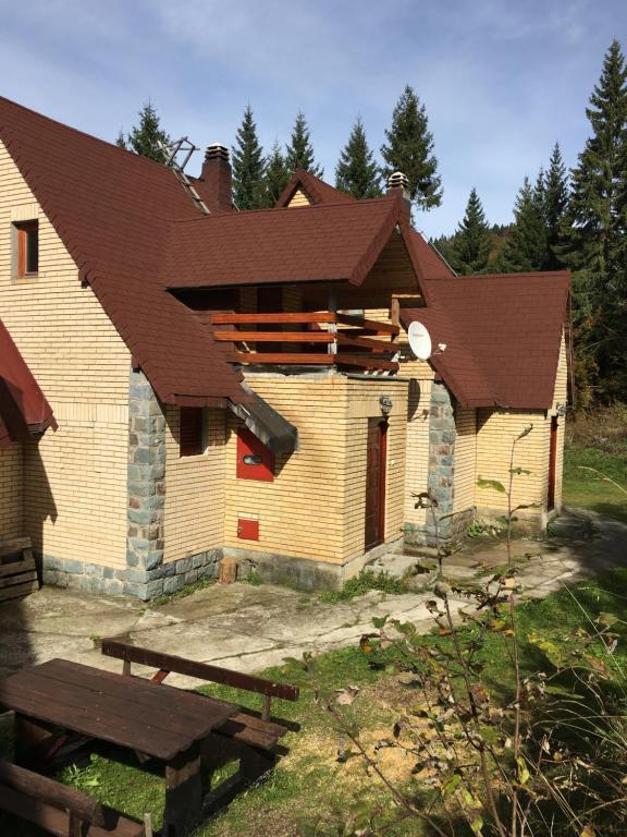 a building with a roof on top of it at Villa Aleksandar in Kopaonik