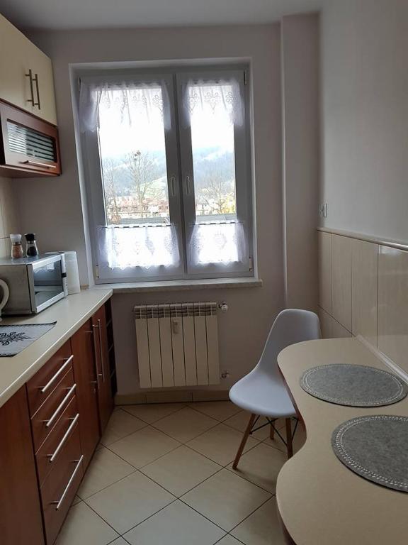 Kuchyňa alebo kuchynka v ubytovaní Apartament Krupówki Centrum