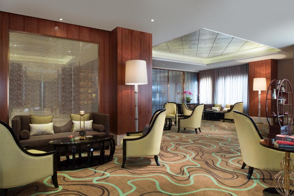 Posezení v ubytování Ramada Plaza Tianlu Hotel