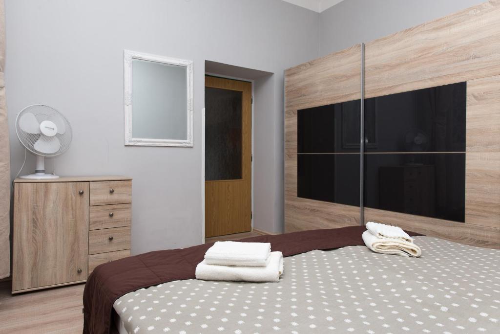 Postel nebo postele na pokoji v ubytování Hotel Richmond Teplice