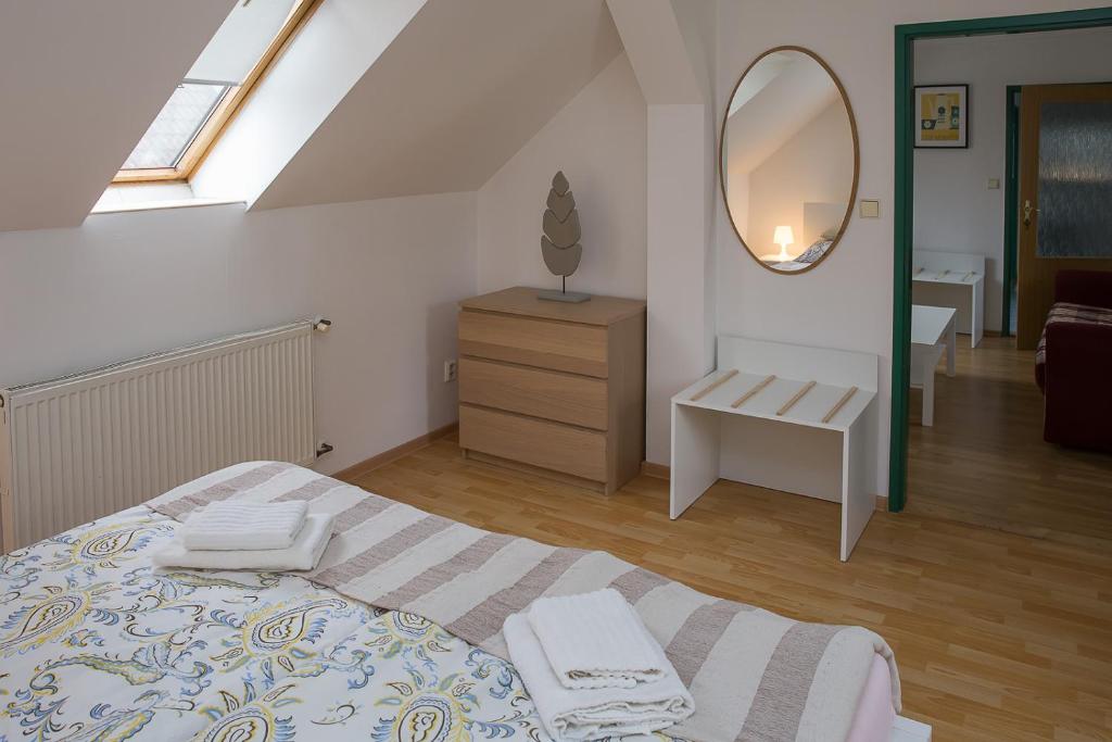 Postel nebo postele na pokoji v ubytování Hotel Richmond Teplice