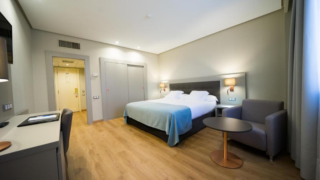 Postel nebo postele na pokoji v ubytování Mercure Carlton Rioja