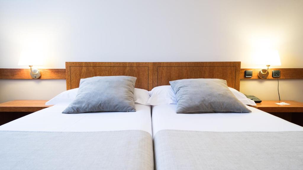 Postel nebo postele na pokoji v ubytování Mercure Carlton Rioja