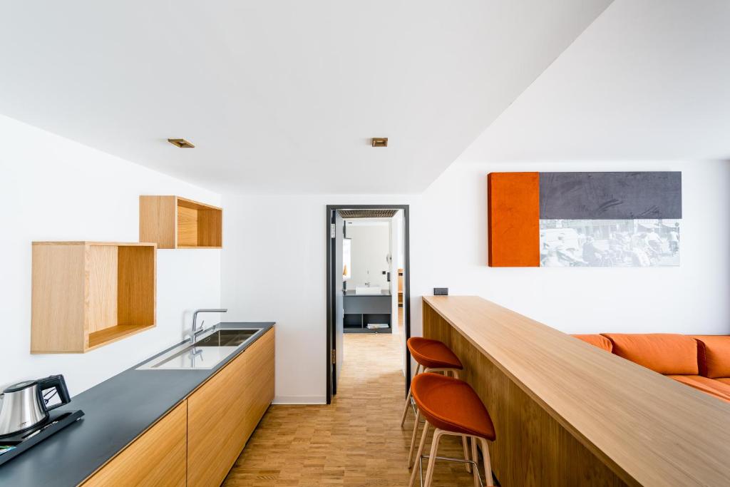 Kuchyň nebo kuchyňský kout v ubytování mk | hotel rüsselsheim