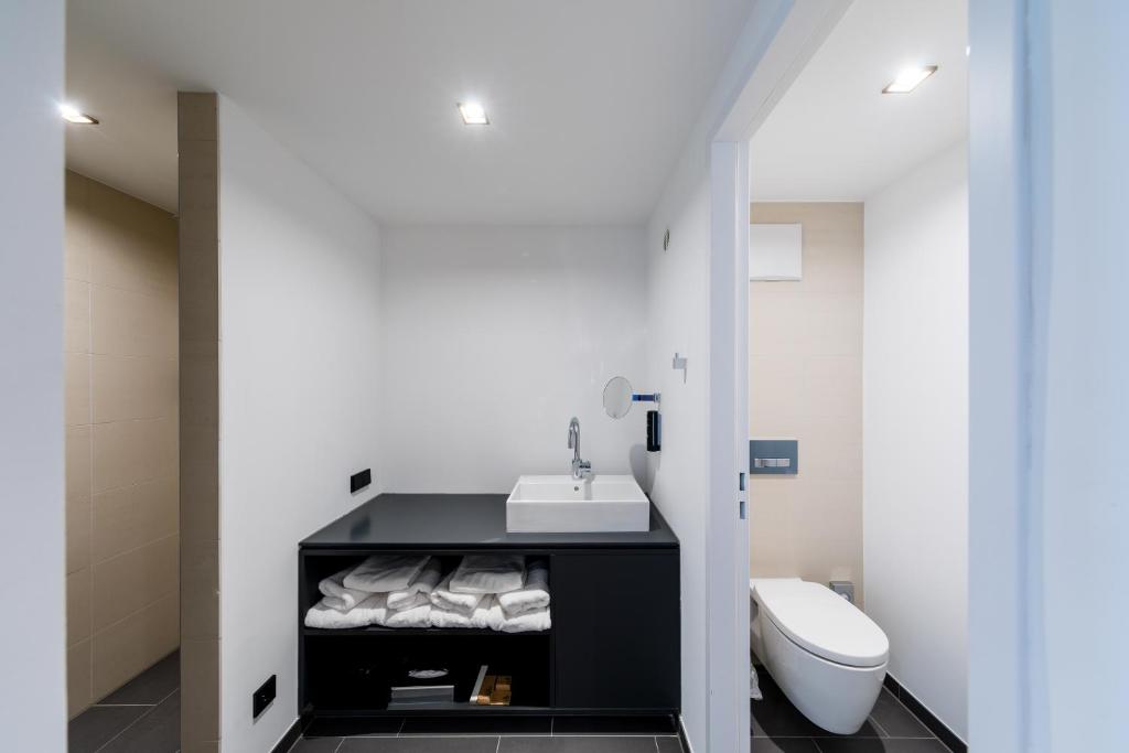 Koupelna v ubytování mk | hotel rüsselsheim