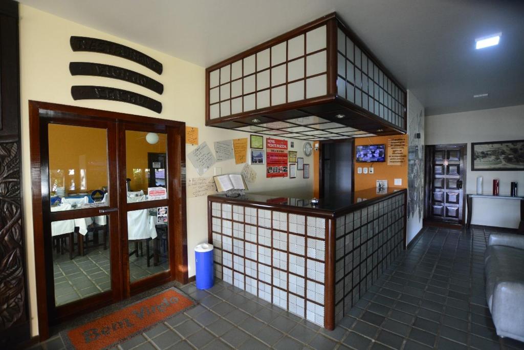 Kuchyň nebo kuchyňský kout v ubytování Hotel Monte Pascoal