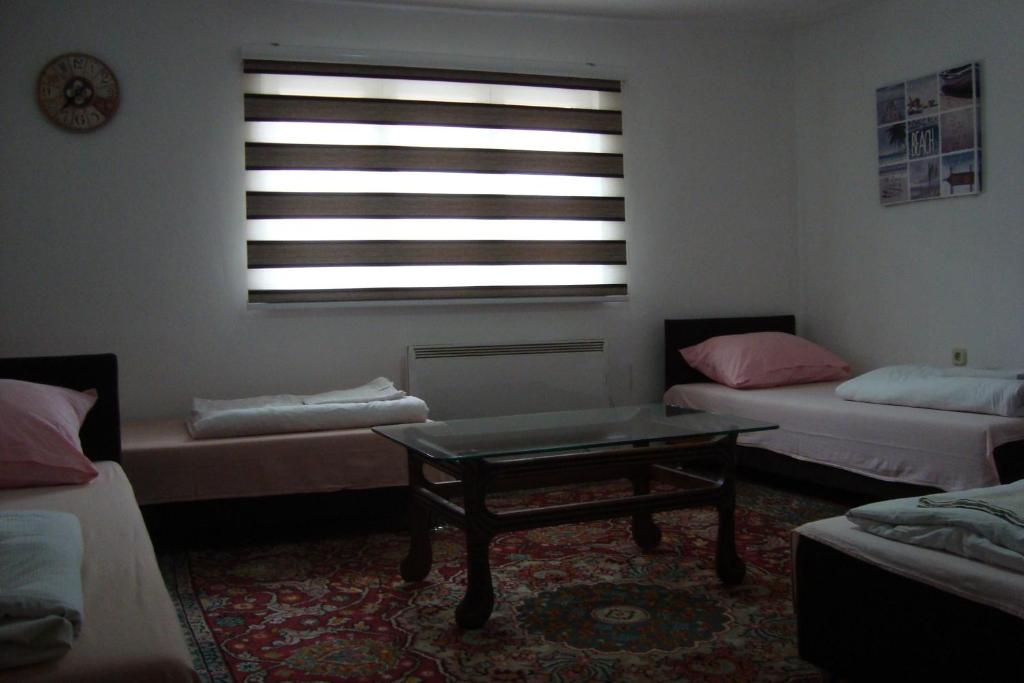 Postel nebo postele na pokoji v ubytování Guest House Džemo