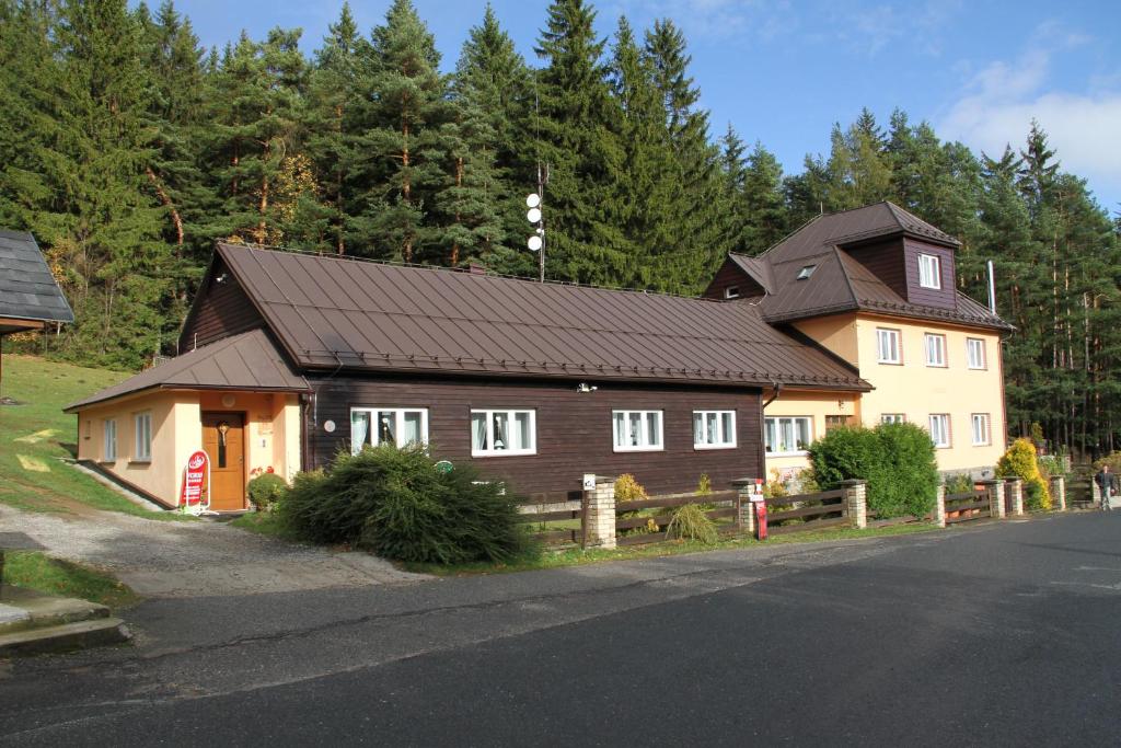 a house on the side of a road at Chata Javorina in Javorník