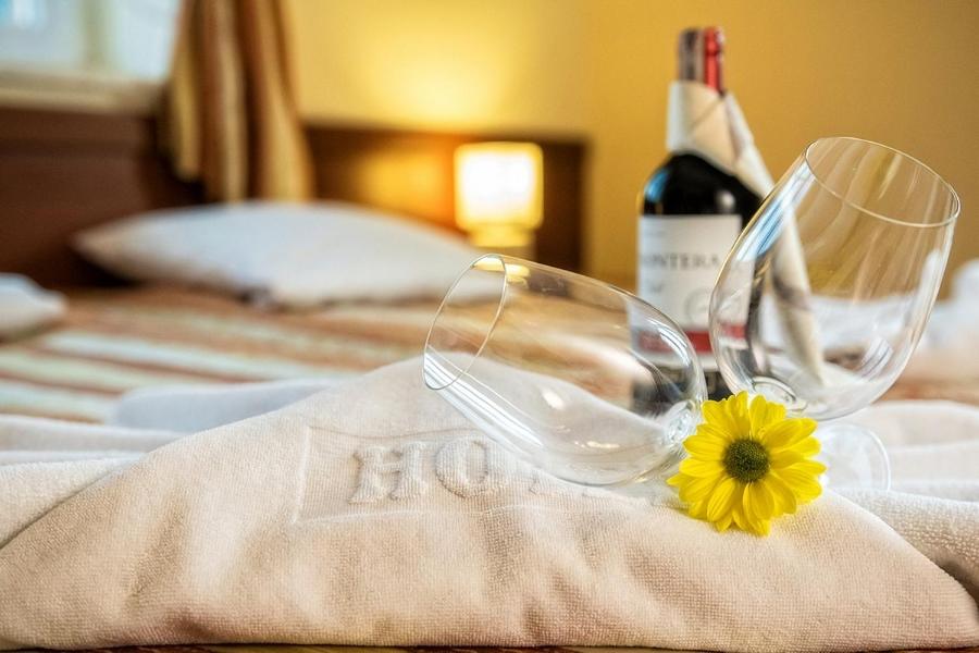 Posteľ alebo postele v izbe v ubytovaní Hotel Pod Gołębiem