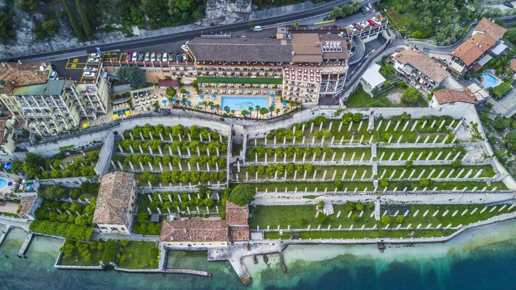 an aerial view of a resort with a garden at Hotel Splendid Palace in Limone sul Garda