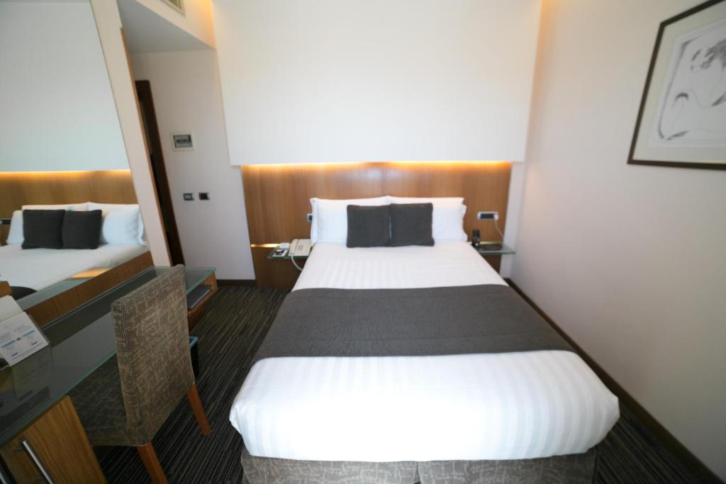 Postel nebo postele na pokoji v ubytování Best Western Plus Hotel Universo