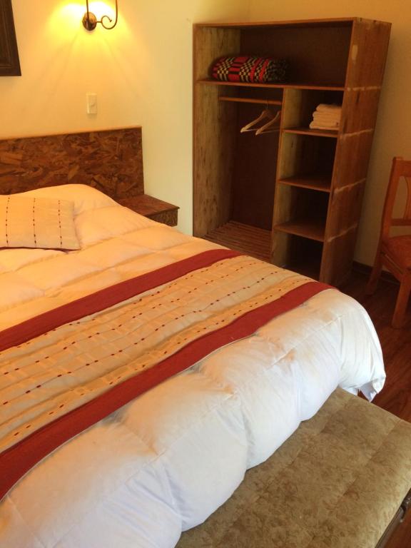 Postel nebo postele na pokoji v ubytování Hotel Haras Casacampo