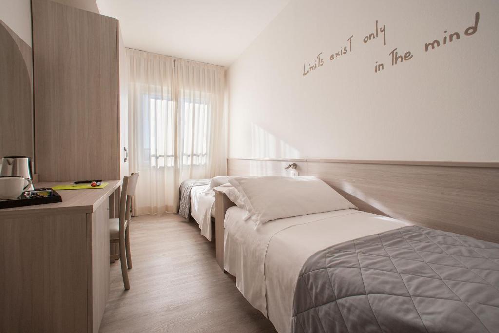 Postel nebo postele na pokoji v ubytování Hotel Anny