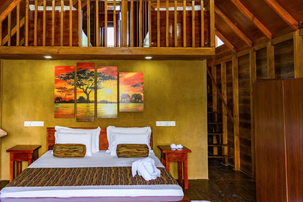 Postel nebo postele na pokoji v ubytování Kandy Cabana