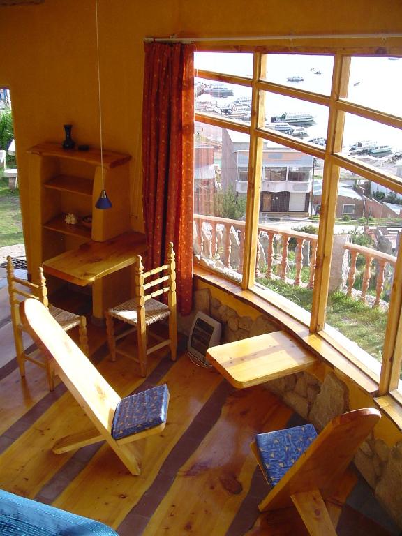Posezení v ubytování Hostal Las Olas