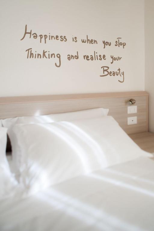 Postel nebo postele na pokoji v ubytování Hotel Anny