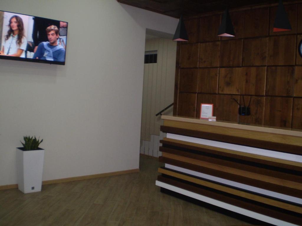 TV a/nebo společenská místnost v ubytování New Hotel