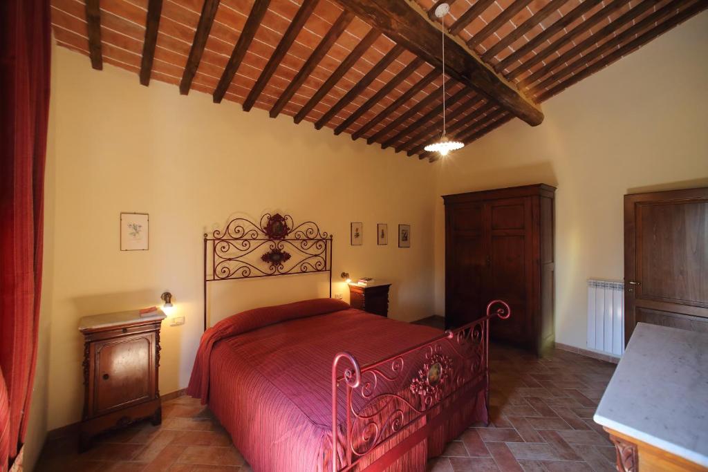 Postel nebo postele na pokoji v ubytování Tenuta Montemassi Podere Montauzzo