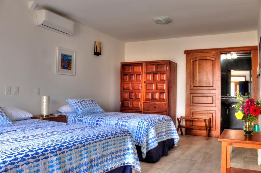 Postel nebo postele na pokoji v ubytování The Isabela Beach House