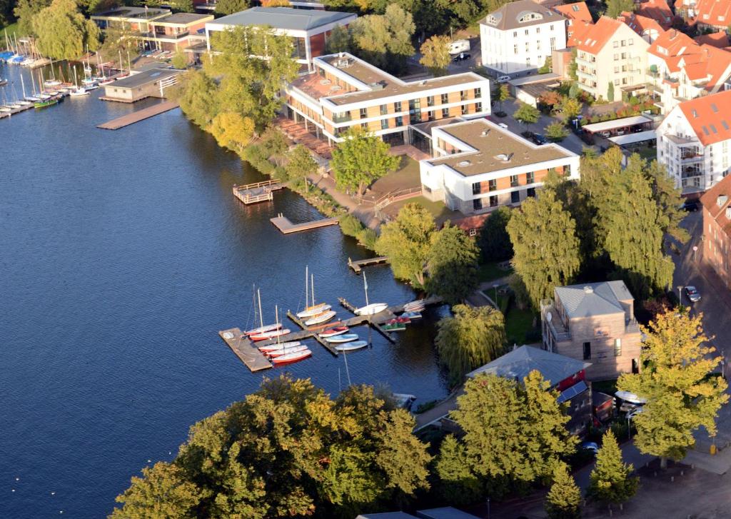an aerial view of a harbor with boats in the water at Jugendherberge Ratzeburg am See in Ratzeburg