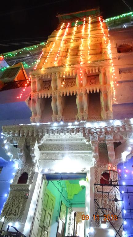 a building with christmas lights on top of it at Amar Niwas Homestay Guesthouse in Jodhpur