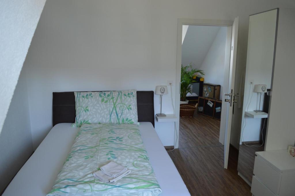 Postel nebo postele na pokoji v ubytování BnB zum Schlüssel